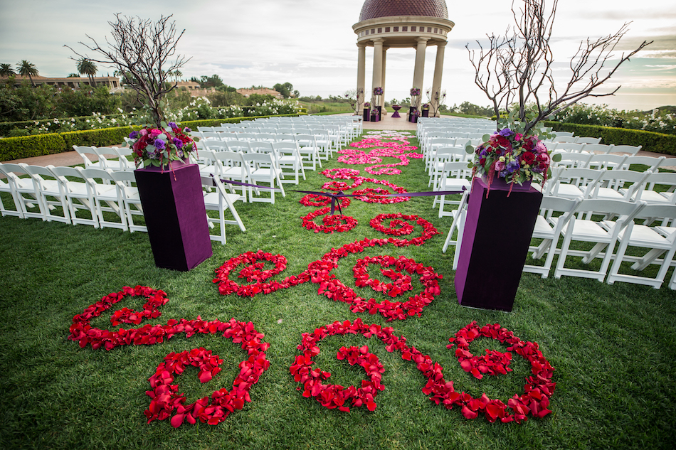 Jewel Toned Pelican Hill Resort Wedding, red floral aisle