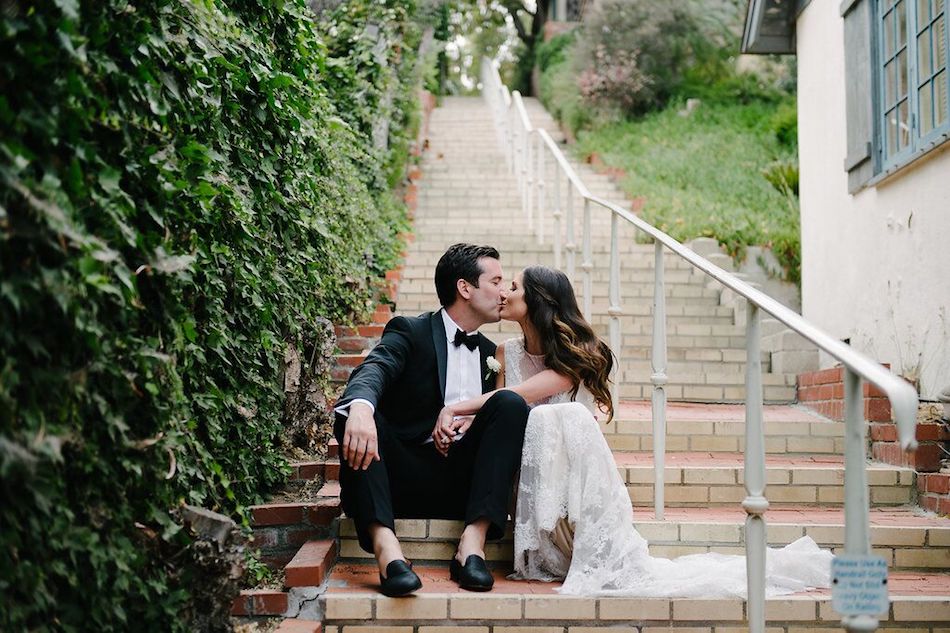 kiss, bride and groom, ocean side, beach wedding, wedding, wedding flowers, flowers by cina