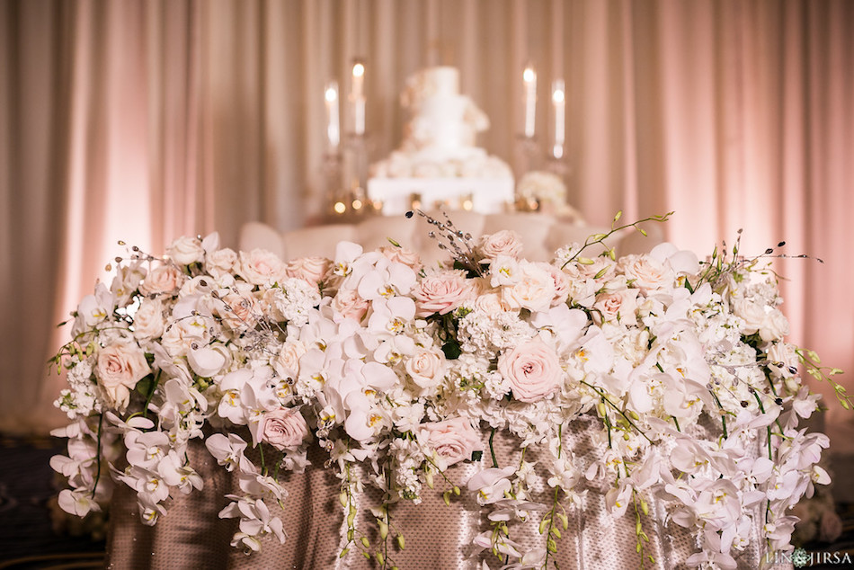 sweetheart table, wedding flowers, flowers, cascade, enchanting laguna cliffs marriott, reception