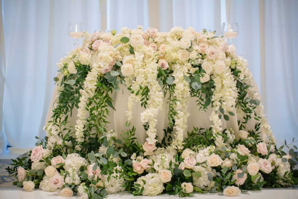 sweetheart table, white blooms, floral-filled table, floral design, florist, wedding florist, wedding flowers, orange county weddings, orange county wedding florist, orange county florist, orange county floral design, flowers by cina