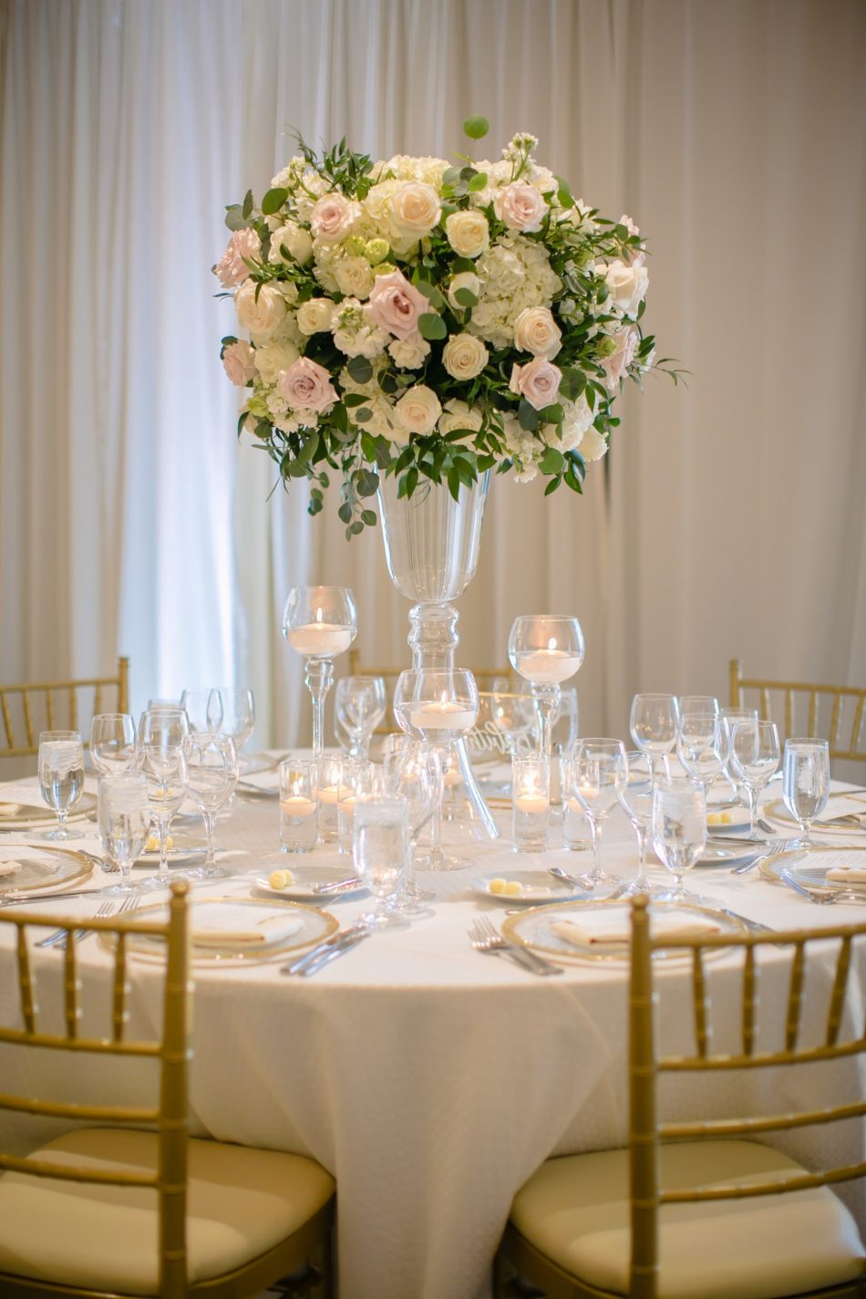 enchanted oceanfront wedding, elevated centerpiece, white centerpiece, blush centerpiece, floral design, florist, wedding florist, wedding flowers, orange county weddings, orange county wedding florist, orange county florist, orange county floral design, flowers by cina