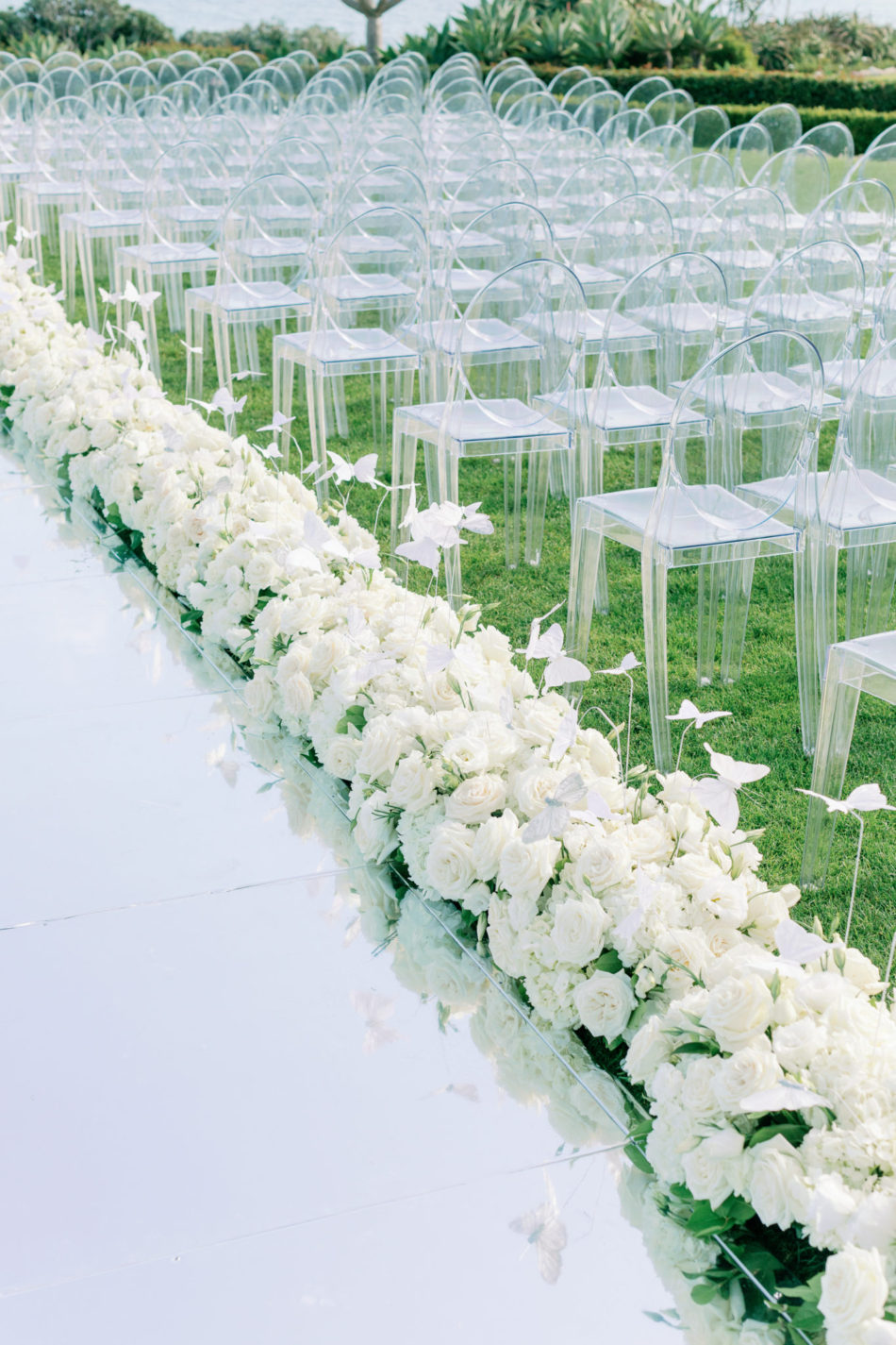 floral-filled aisle, mirrored aisle, lavish oceanfront wedding, floral design, florist, wedding florist, event florist, wedding flowers, event flowers, cabo san lucas weddings, cabo san lucas wedding florist, cabo san lucas florist, cabo san lucas floral design, cabo rentals, flowers and events