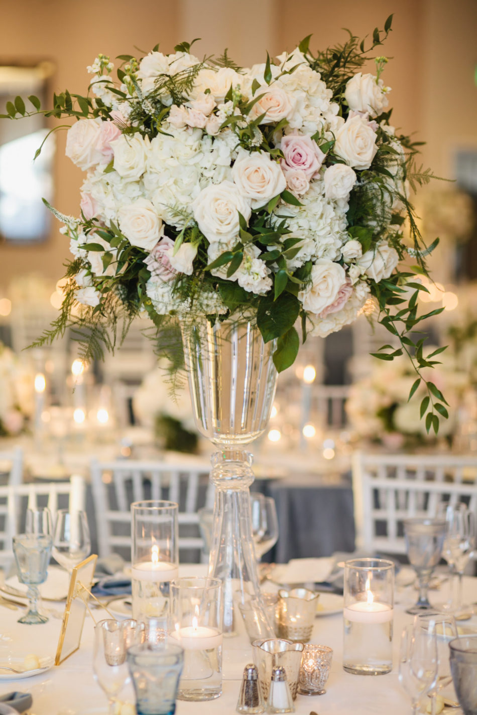 classic blue hued wedding, elevated centerpiece, blue reception decor, beautiful coastal wedding, floral design, florist, wedding florist, wedding flowers, orange county weddings, orange county wedding florist, orange county florist, orange county floral design, flowers by cina