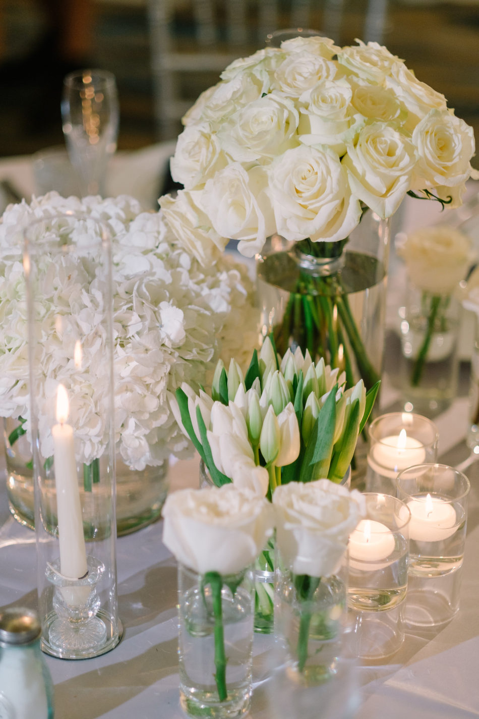 white blooms, white centerpieces, white florals, magnificent all-white wedding, floral design, florist, wedding florist, wedding flowers, orange county weddings, orange county wedding florist, orange county florist, orange county floral design, flowers by cina