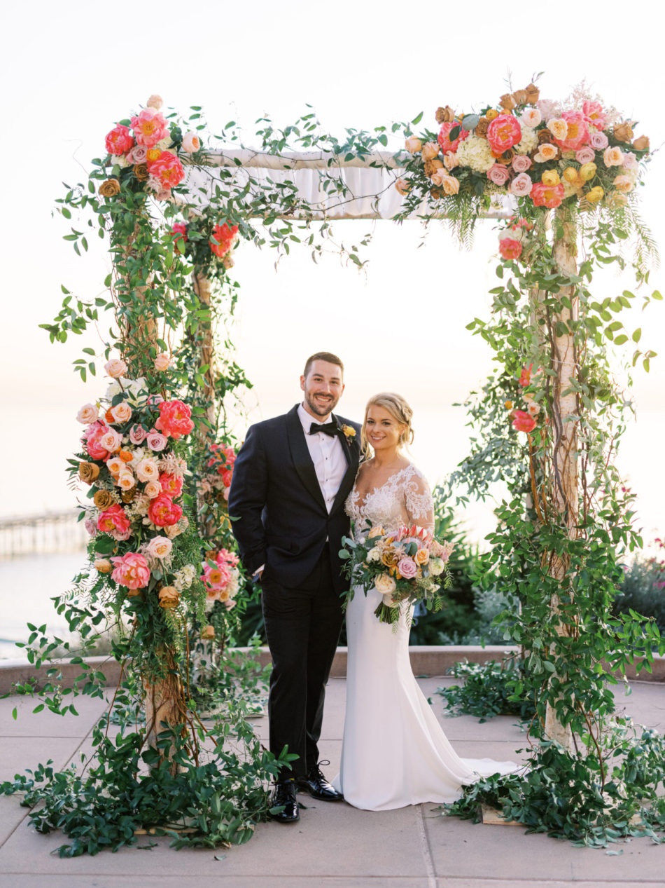 floral arch, bride and groom, gorgeous alfresco reception, floral design, florist, wedding florist, wedding flowers, orange county weddings, orange county wedding florist, orange county florist, orange county floral design, flowers by cina