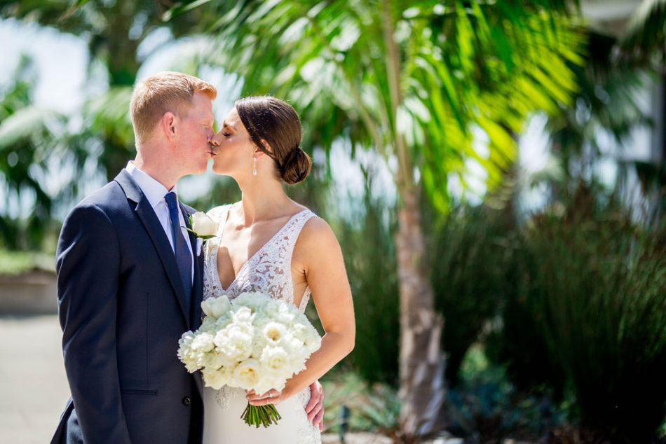 first kiss, newlyweds, ethereal white wedding, florist, wedding florist, wedding flowers, orange county weddings, orange county wedding florist, orange county florist, orange county floral design, flowers by cina