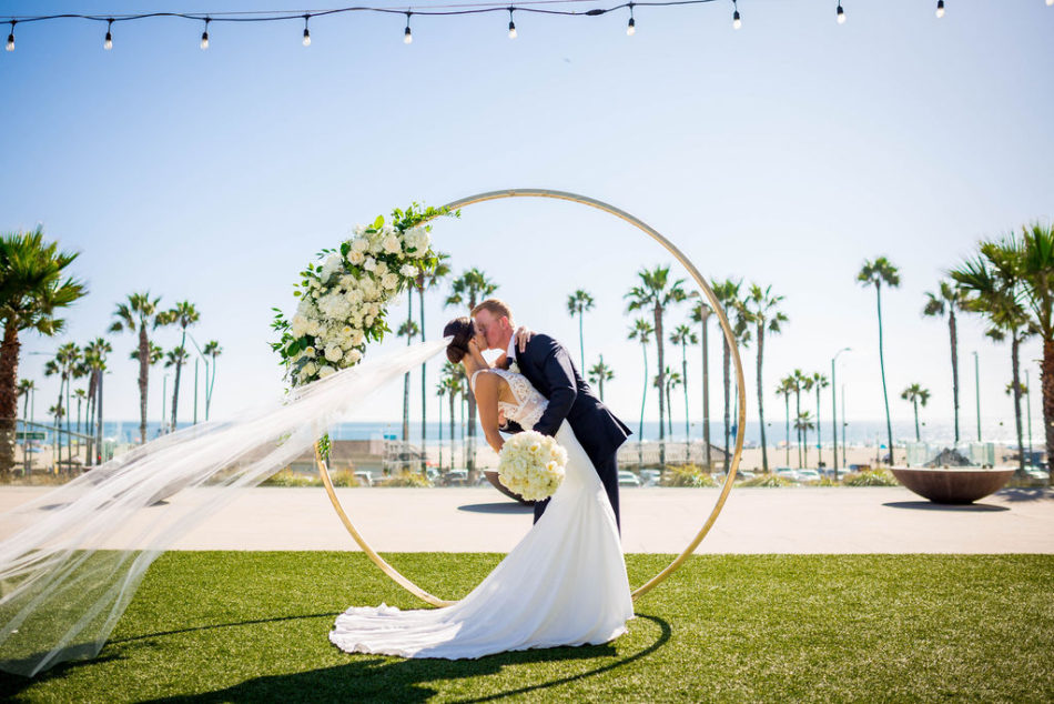first kiss, bride and groom, ethereal white wedding, florist, wedding florist, wedding flowers, orange county weddings, orange county wedding florist, orange county florist, orange county floral design, flowers by cina