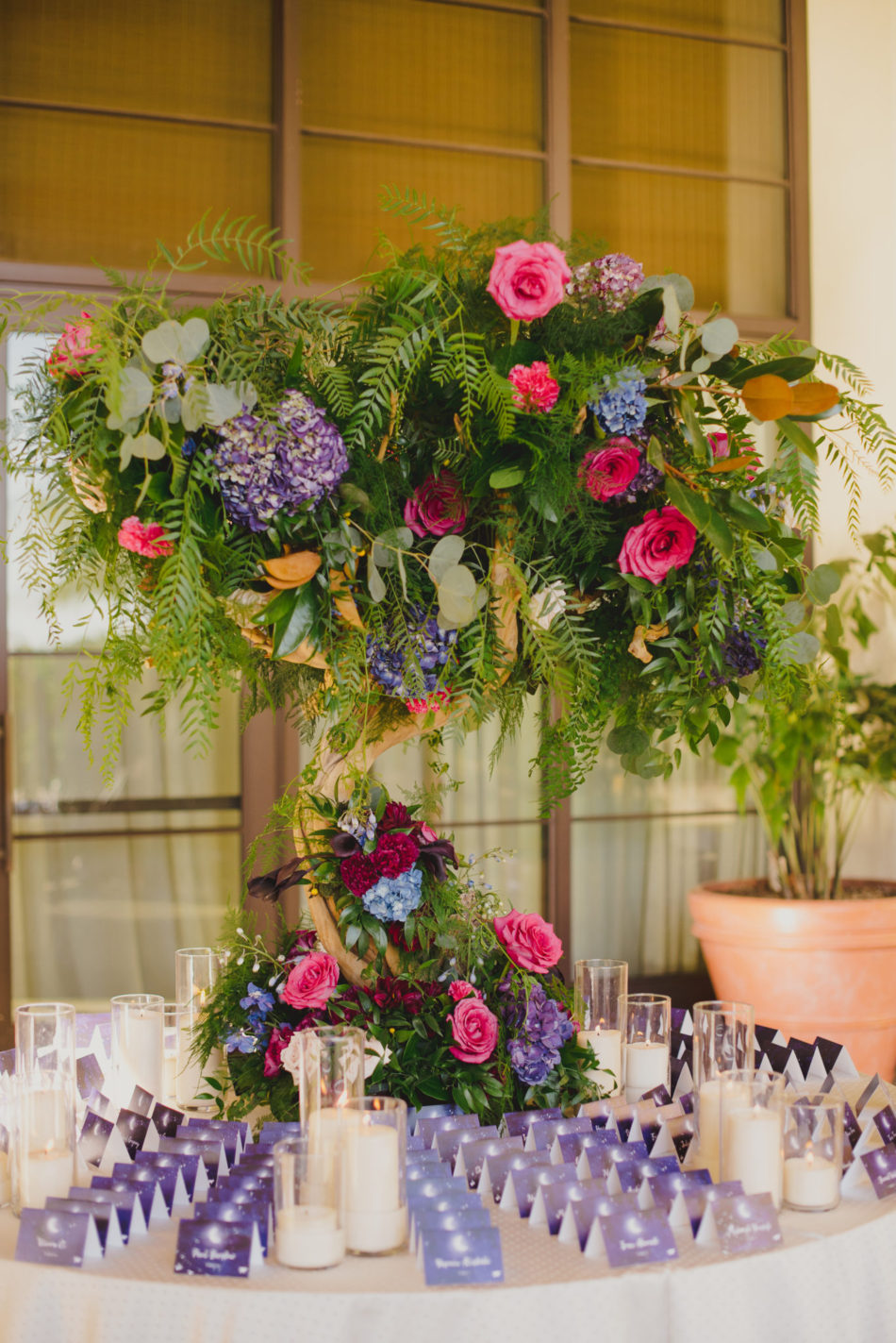 colorful escort card display, purple escort cards, vibrant oceanfront wedding, floral design, florist, wedding florist, wedding flowers, orange county weddings, orange county wedding florist, orange county florist, orange county floral design, flowers by cina