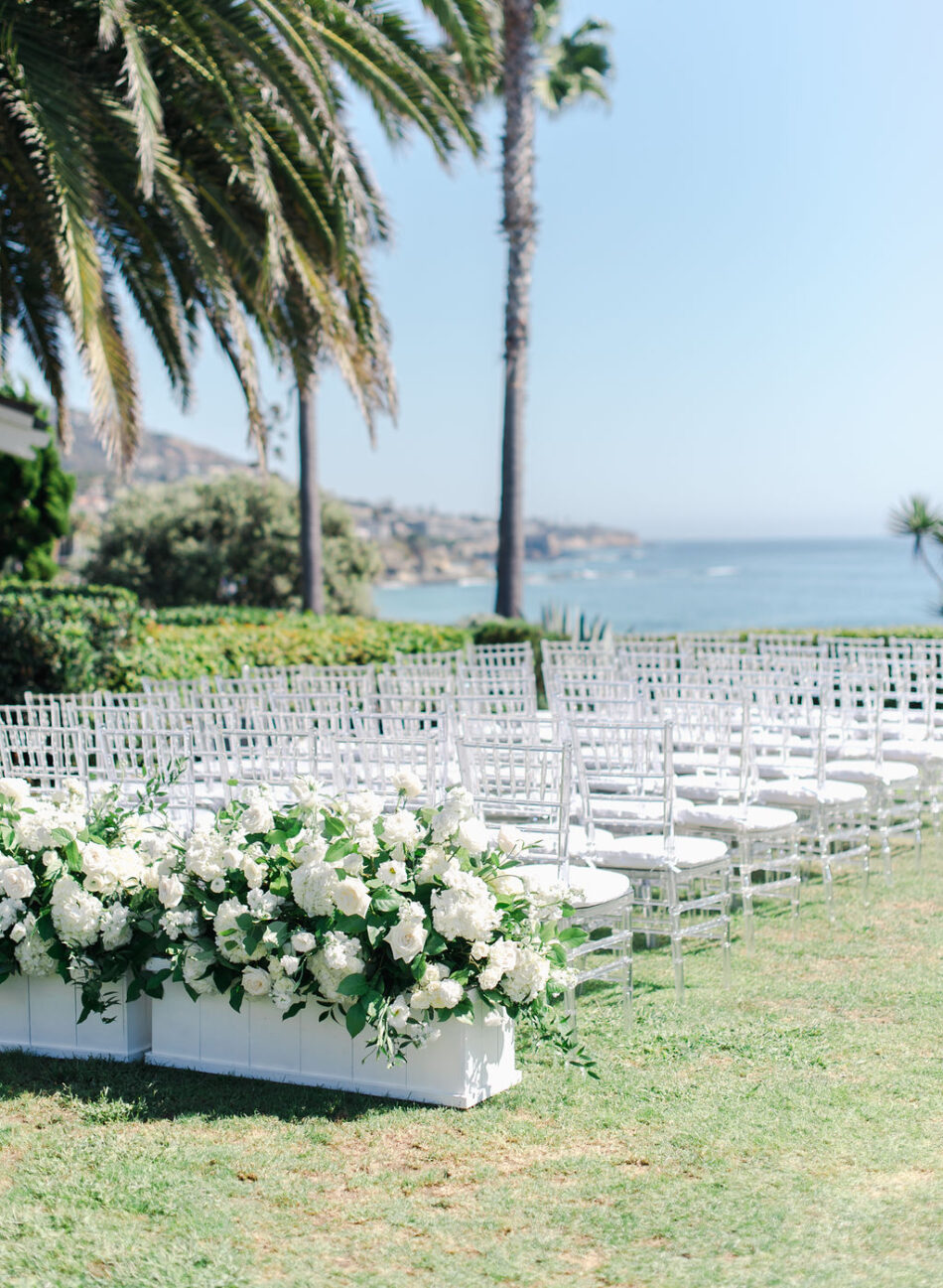 all-white ceremony, white ceremony blooms, white ceremony decor, gorgeous oceanfront wedding, floral design, florist, wedding florist, wedding flowers, orange county weddings, orange county wedding florist, orange county florist, orange county floral design, flowers by cina