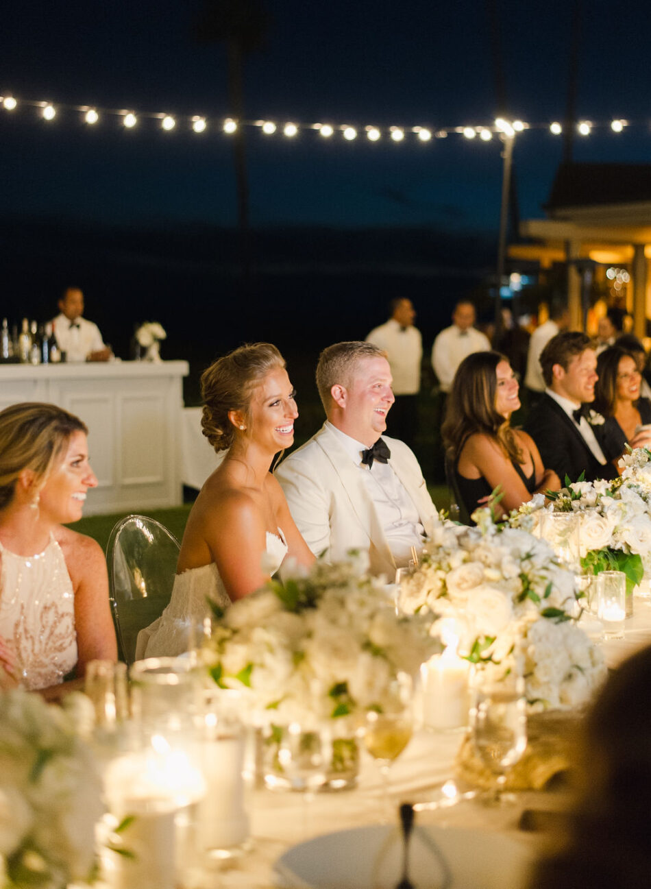 newlyweds, head table, outdoor reception, gorgeous oceanfront wedding, floral design, florist, wedding florist, wedding flowers, orange county weddings, orange county wedding florist, orange county florist, orange county floral design, flowers by cina