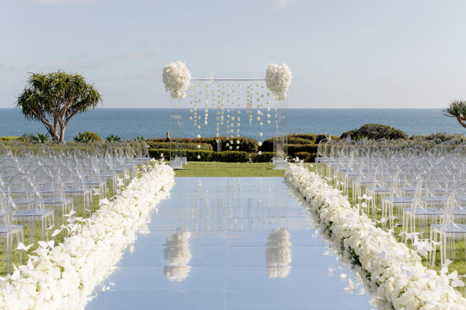 all-white ceremony florals, oceanfront ceremony, memorable floral-filled ceremony setups, floral design, florist, wedding florist, wedding flowers, orange county weddings, orange county wedding florist, orange county florist, orange county floral design, flowers by cina