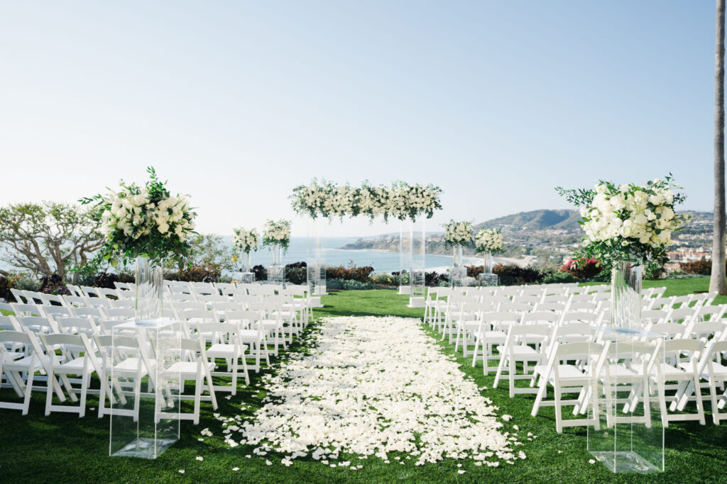 petal-filled aisle, all-white oceanwedding, floral-filled outdoor ceremony, ethereal oceanfront wedding, floral design, florist, wedding florist, wedding flowers, orange county weddings, orange county wedding florist, orange county florist, orange county floral design, flowers by cina