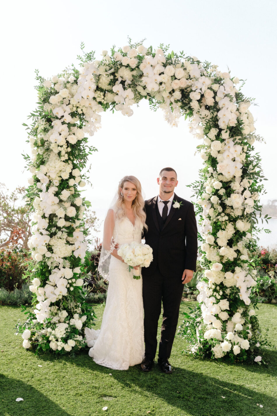 floral arch, newlyweds, beautiful floral-filled wedding, floral design, florist, wedding florist, wedding flowers, orange county weddings, orange county wedding florist, orange county florist, orange county floral design, flowers by cina