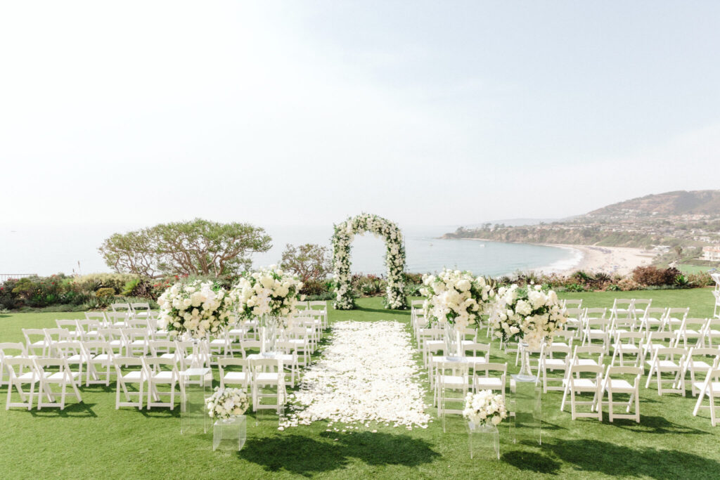 all-white ceremony, oceanfront ceremony, beautiful floral-filled wedding, floral design, florist, wedding florist, wedding flowers, orange county weddings, orange county wedding florist, orange county florist, orange county floral design, flowers by cina