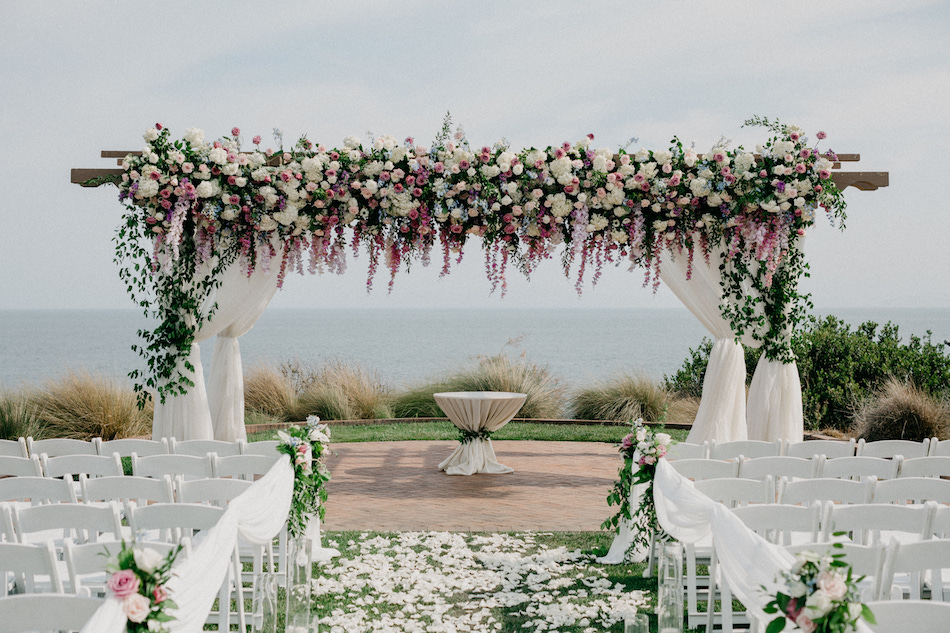 ceremony arch, floral arch, purple chuppah, floral design, florist, wedding florist, wedding flowers, orange county weddings, orange county wedding florist, orange county florist, orange county floral design, flowers by cina, floral-filled ceremony, purple ceremony arch, chuppah