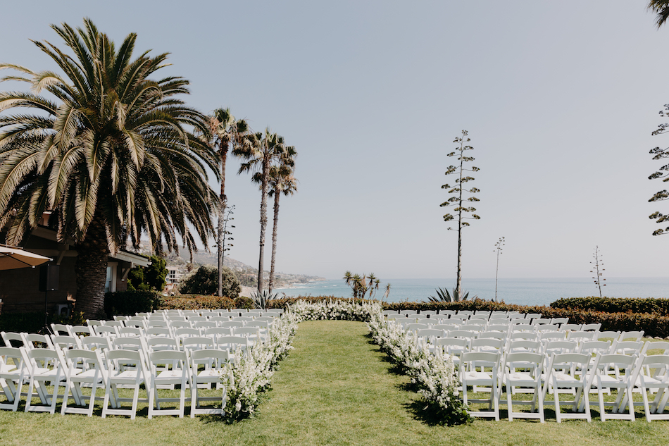 outdoor reception, all-white ceremony florals, oceanfront wedding, floral design, florist, wedding florist, wedding flowers, orange county weddings, orange county wedding florist, orange county florist, orange county floral design, flowers by cina