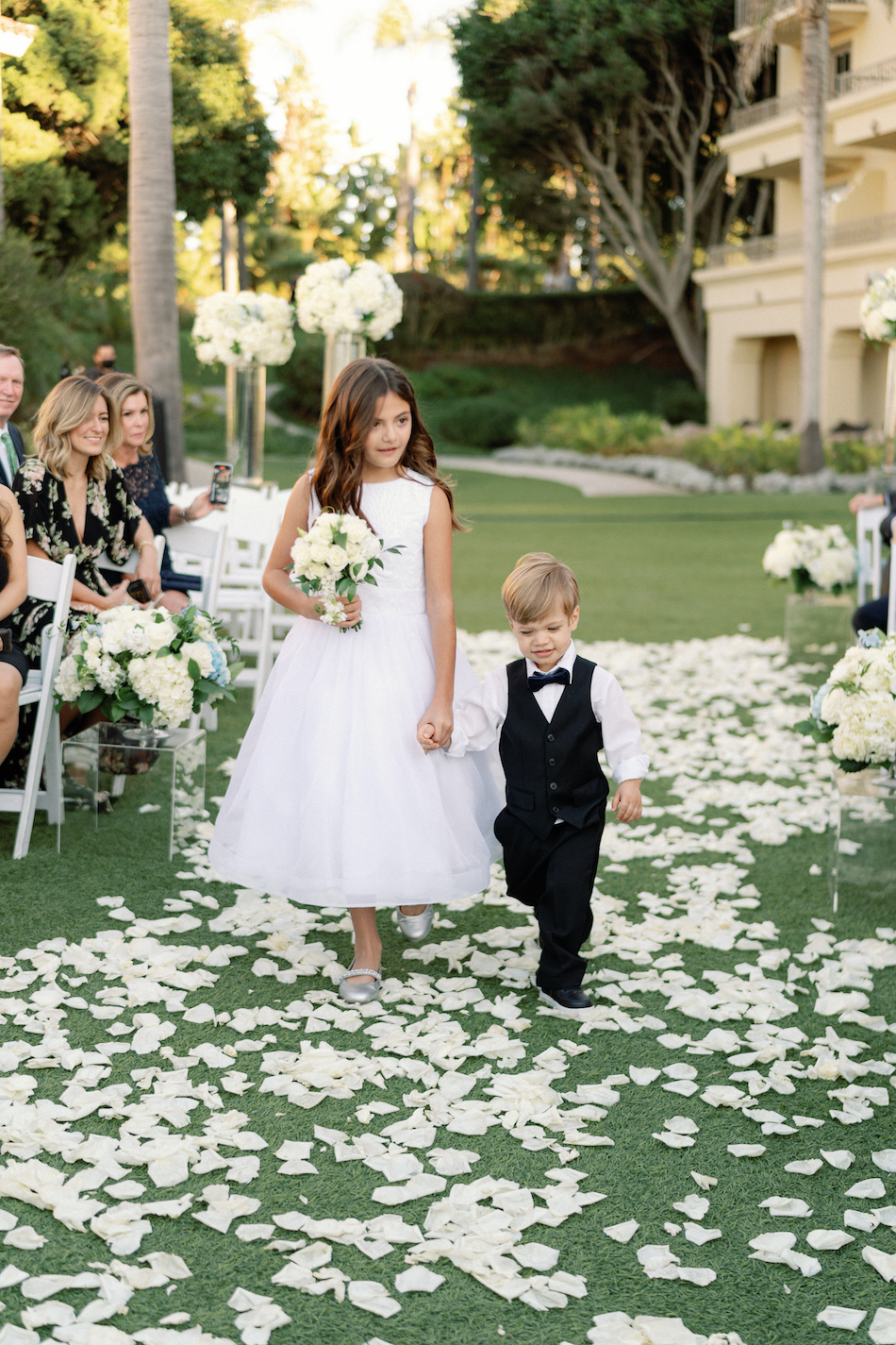 white rose petals, petal-filled aisle, flower girl, floral design, florist, wedding florist, wedding flowers, orange county weddings, orange county wedding florist, orange county florist, orange county floral design, flowers by cina