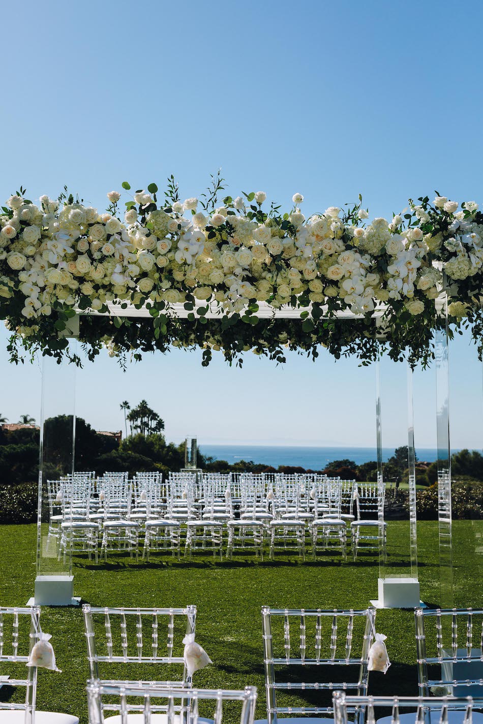 floral design, florist, wedding florist, wedding flowers, orange county weddings, orange county wedding florist, orange county florist, orange county floral design, flowers by cina, floral arch, white chuppah, oceanfront wedding