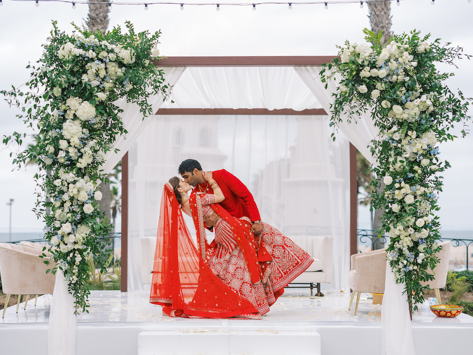 red wedding attire, white ceremony florals, ceremony structure, floral design, florist, wedding florist, wedding flowers, orange county weddings, orange county wedding florist, orange county florist, orange county floral design, flowers by cina