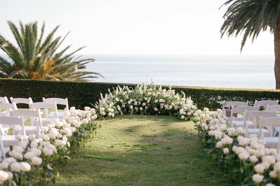 floral design, florist, wedding florist, wedding flowers, orange county weddings, orange county wedding florist, orange county florist, orange county floral design, flowers by cina, white ceremony florals, oceanfront ceremony space, white ceremony blooms